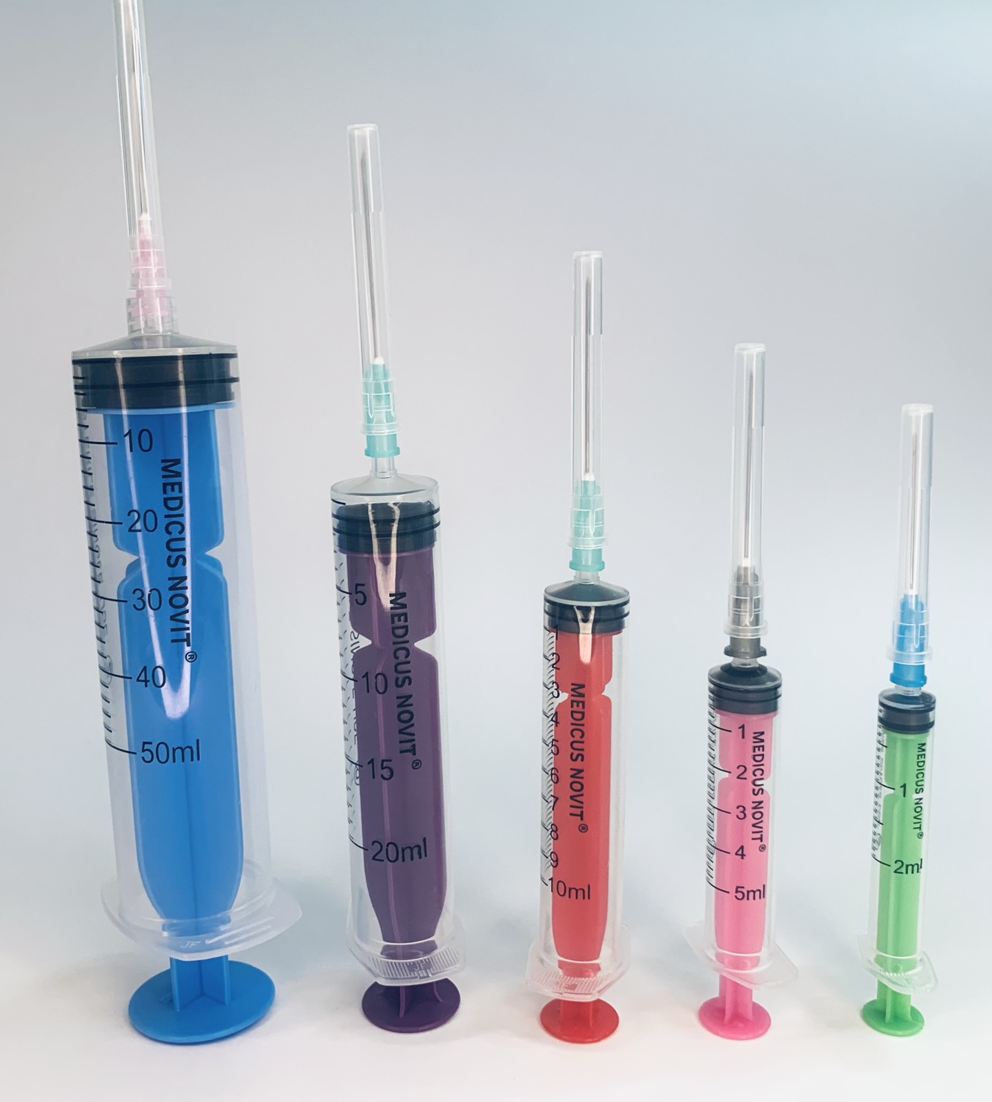 Шприц MEDICUS NOVIT ін'єкційний 3-х компонентний одноразовий стерильний 10мл Luer Slip з голкою 21G (0,8х40мм), кольоровий поршень